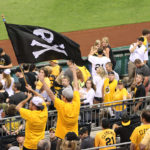 Pirates fans with the Jolly Roger