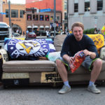 penguins fan on a couch